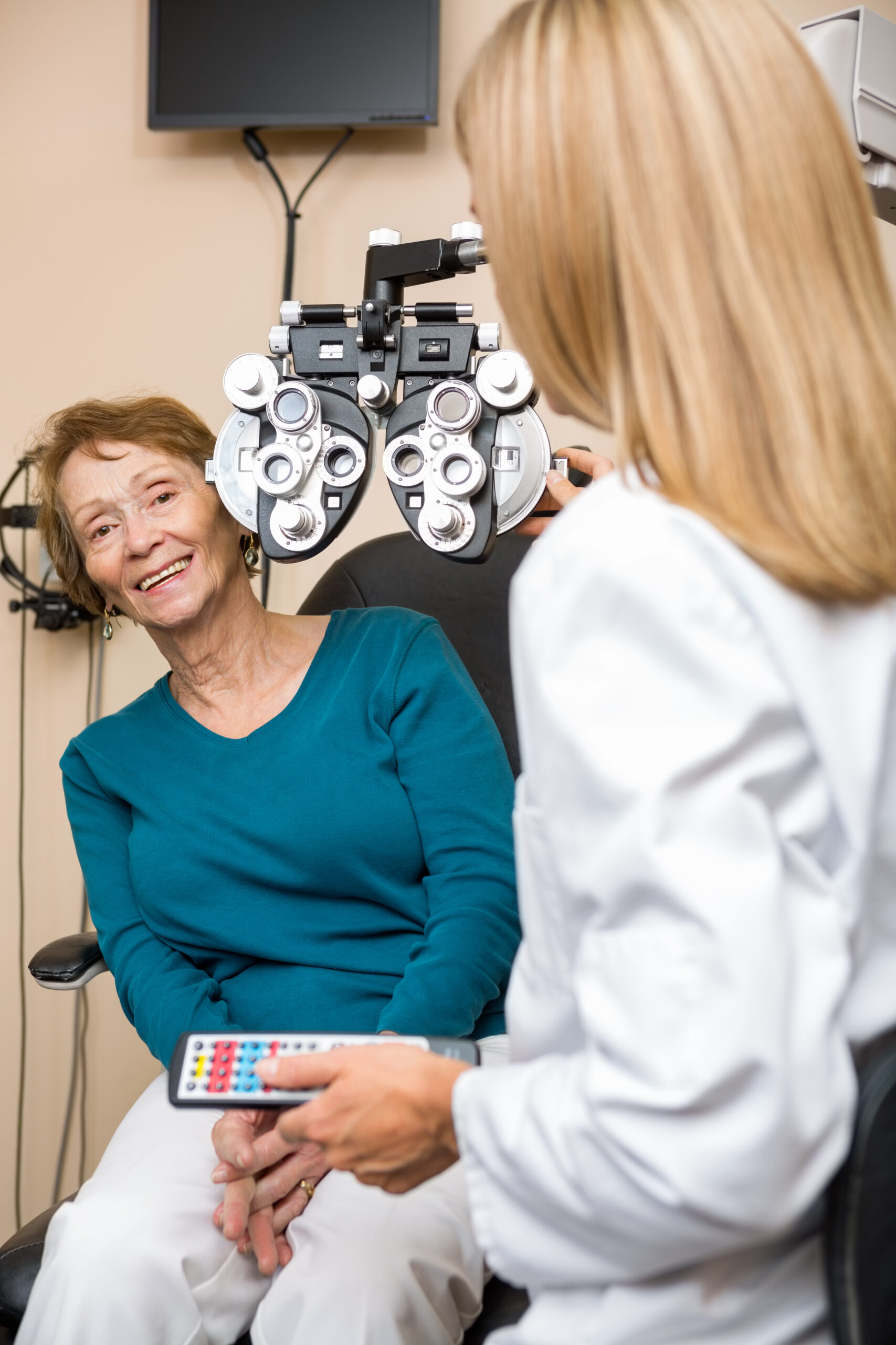 Smiling Senior Woman Undergoing Eye Checkup